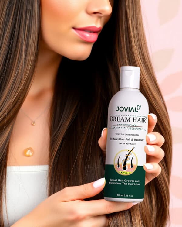 jovial care dream hair growth oil bottle in hand